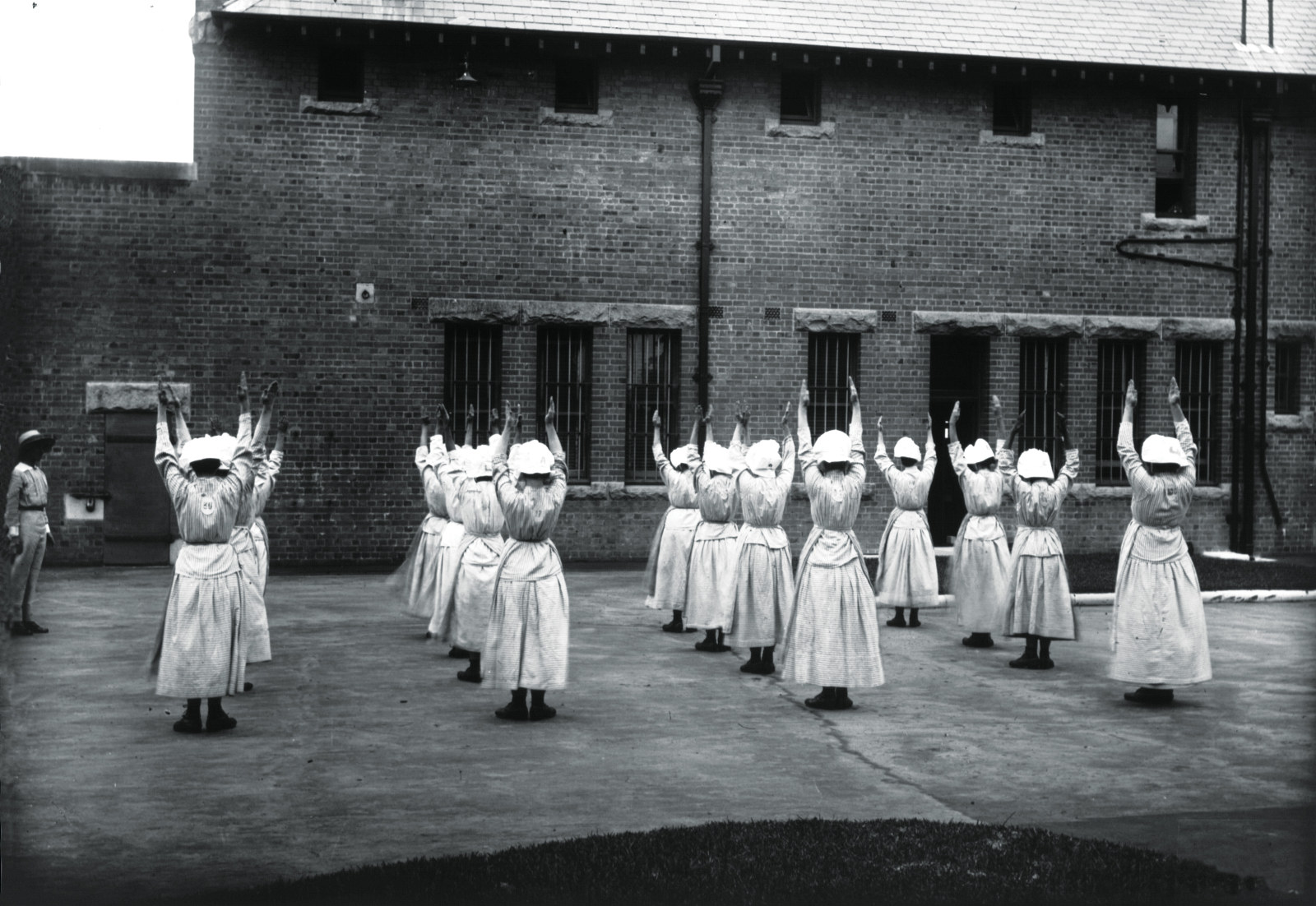 Women are exercising in the grounds of the State Reformatory for Women, located in Sydney’s Long Bay. 1930s-1980s. 