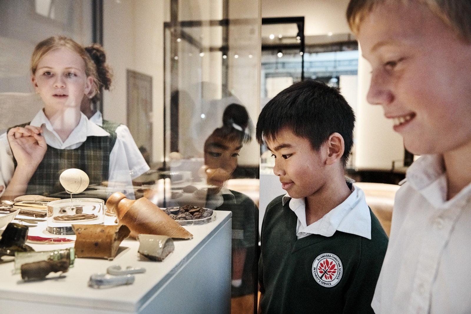 Students examine the archaeology from Hyde Park Barracks on the Home: Convicts, Migrants & First People Learning program