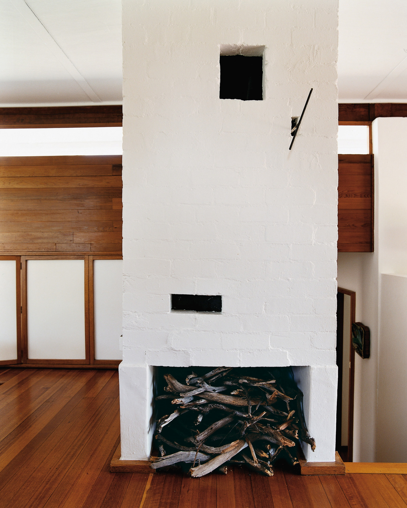 Painted brick fireplace of the Dingle House