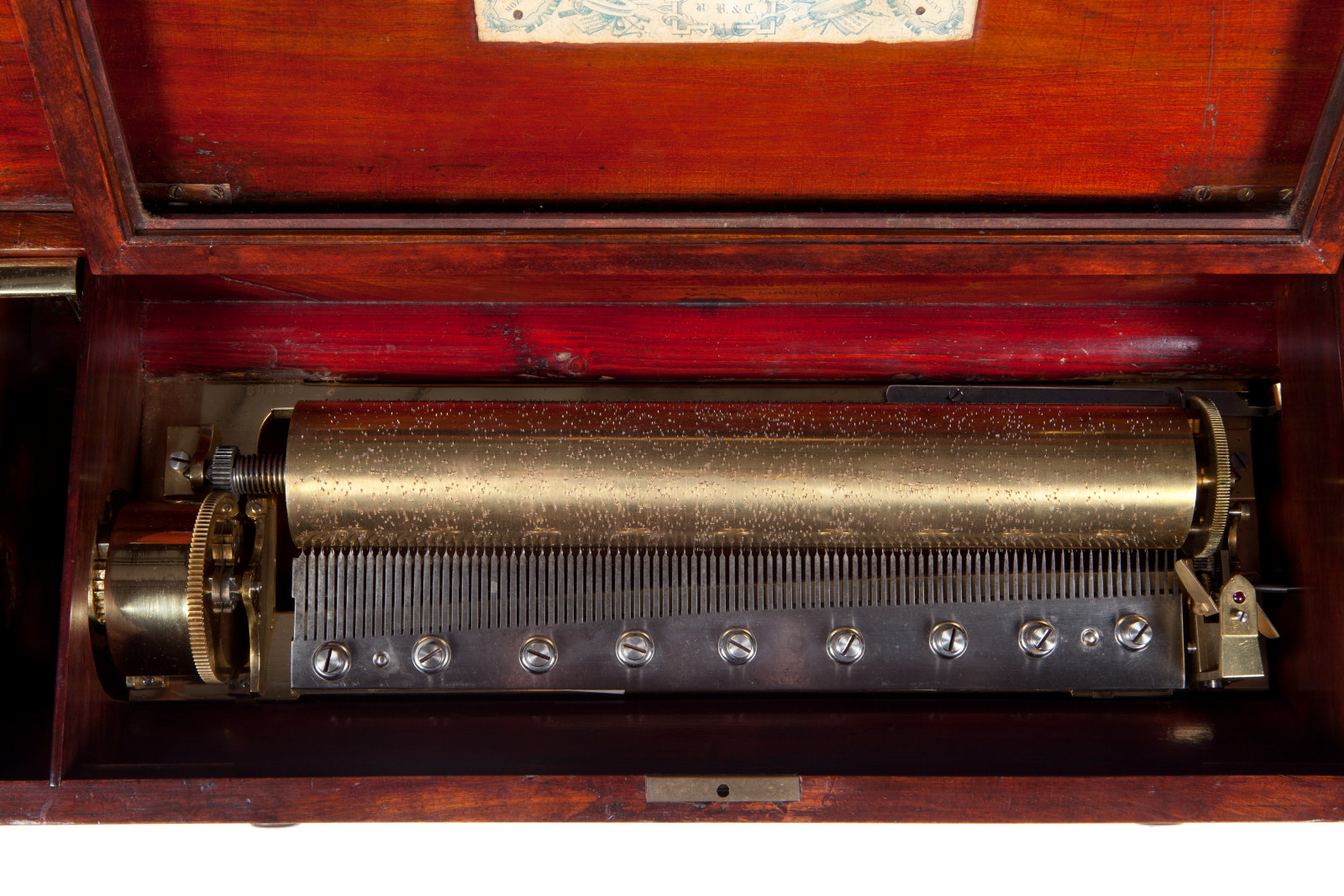 Eight tune music box housed in a fruit wood case, manufactured by Le Coultre, Geneva, c1860