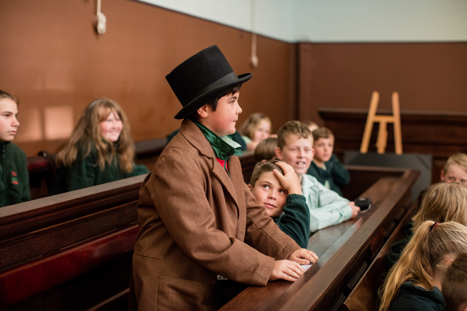 A student in costume for an immersive re-enactment of the trial of Bushranger John Vane during the program Bailed Up! at the Justice and Police Museum
