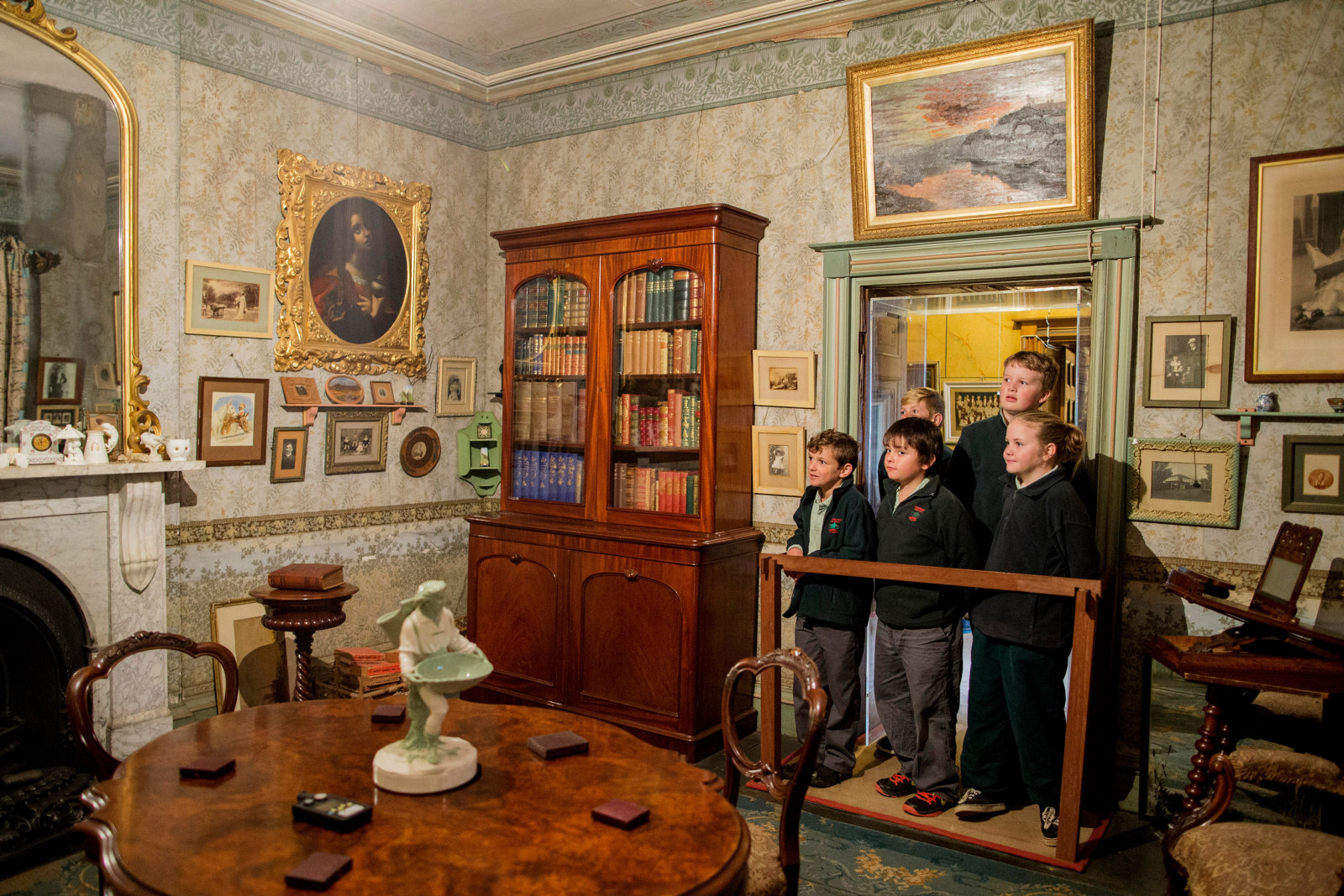 Students looking into the formal Sitting Room of Rouse Hill House during the program Expanding the Colony at Rouse Hill Estate