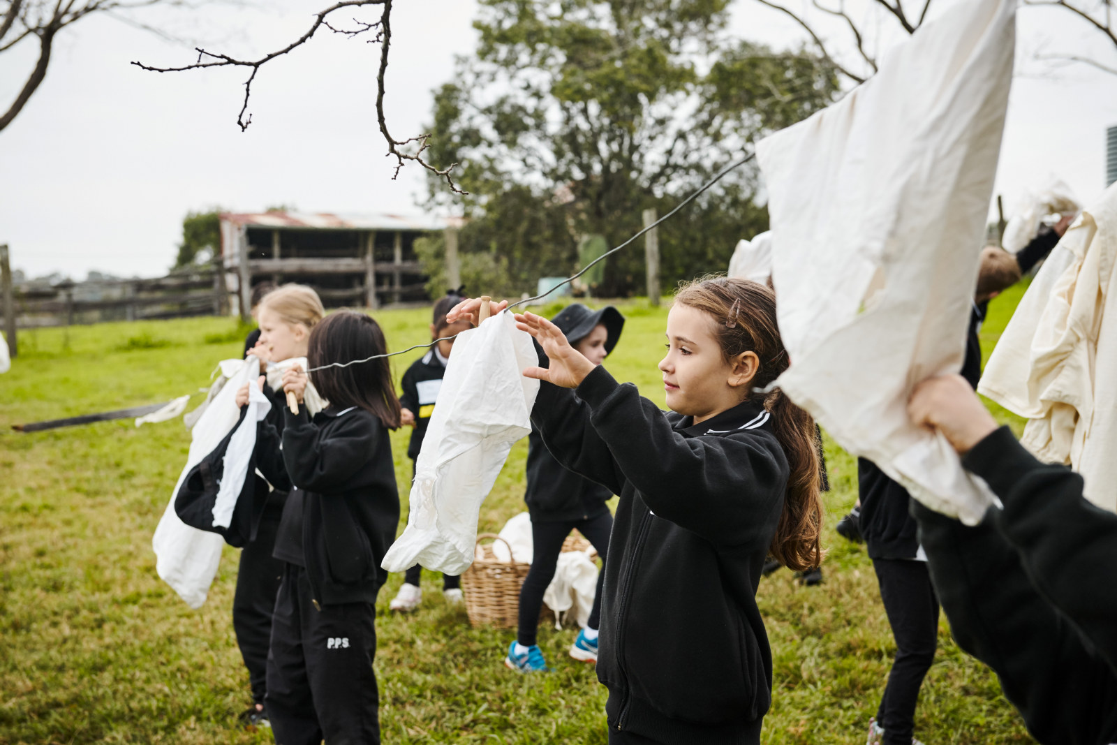 Students hanging out the washing during Early to Rise at Rouse Hill Estate