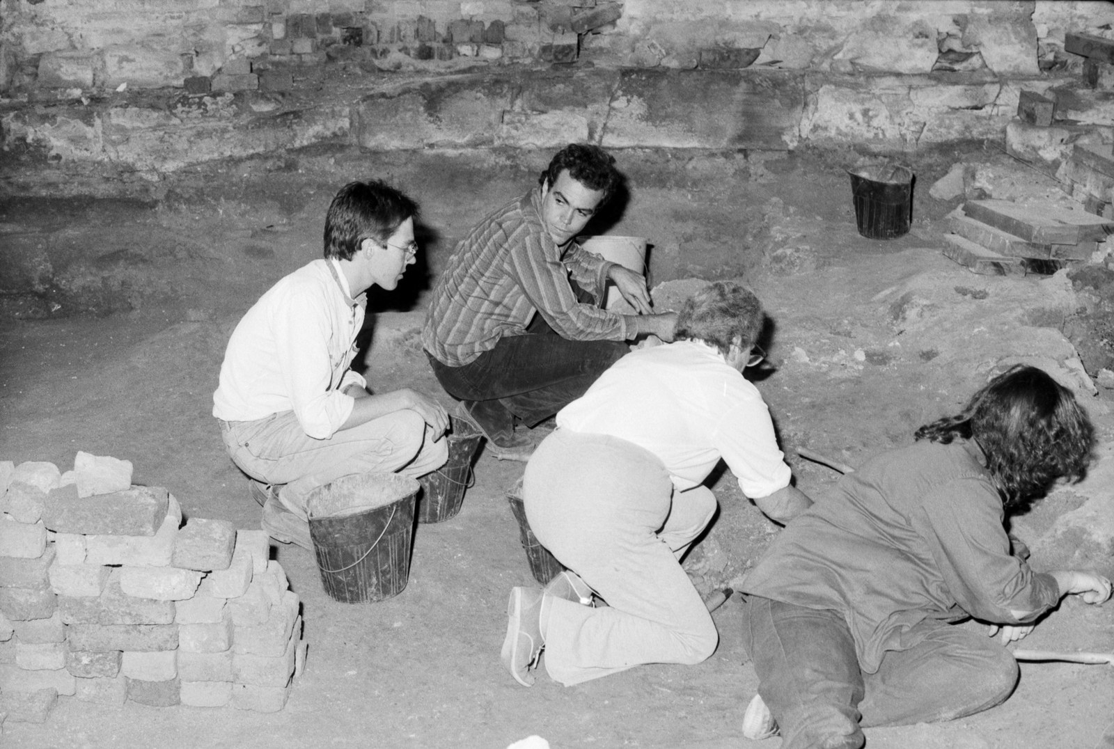 Archaeologist Robert Varman and three volunteers excavating a room on the ground floor at Hyde Park Barracks, 1981.