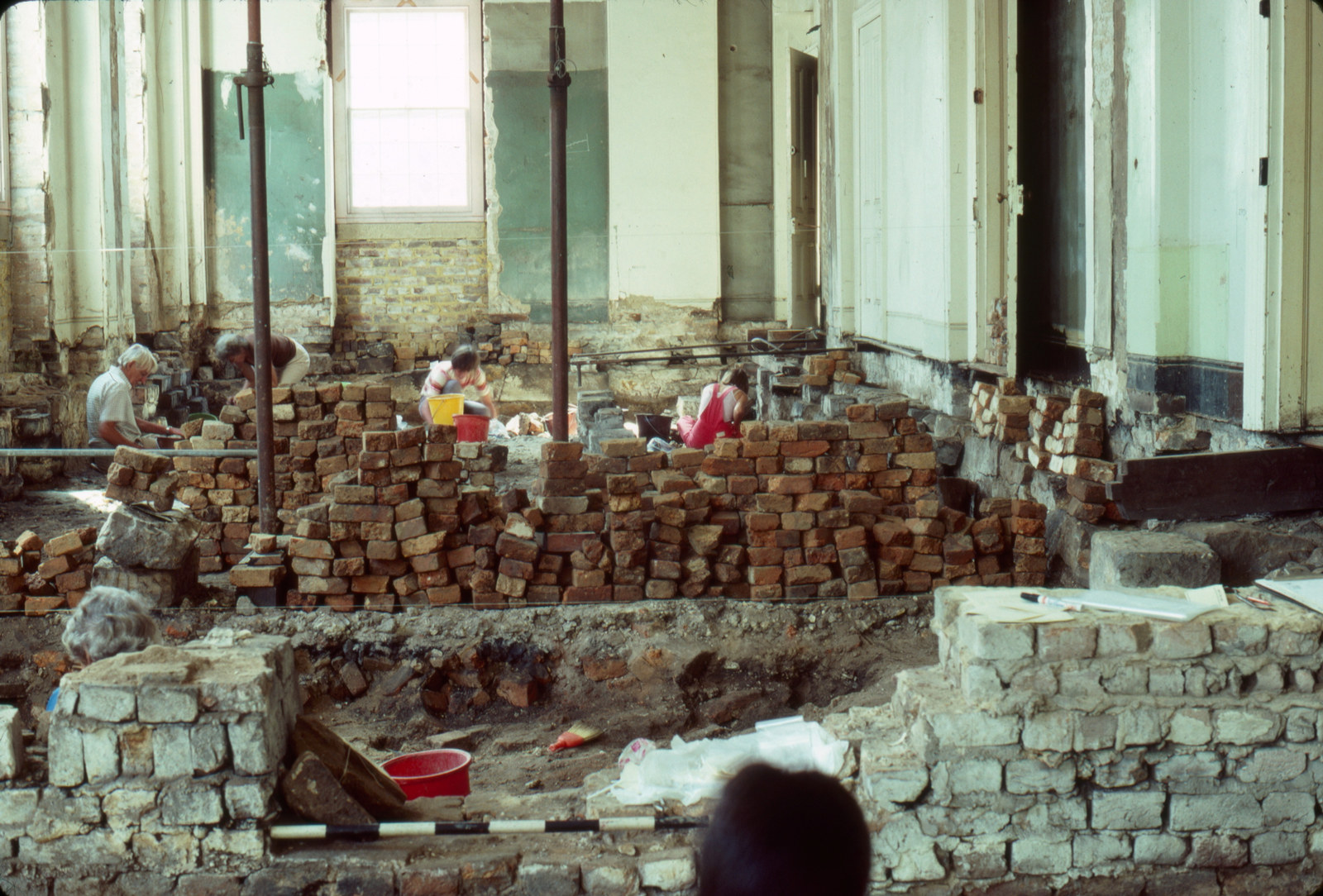 Stacks of convict-made sandstock bricks, recovered during underground excavations, Hyde Park Barracks, 1981.  