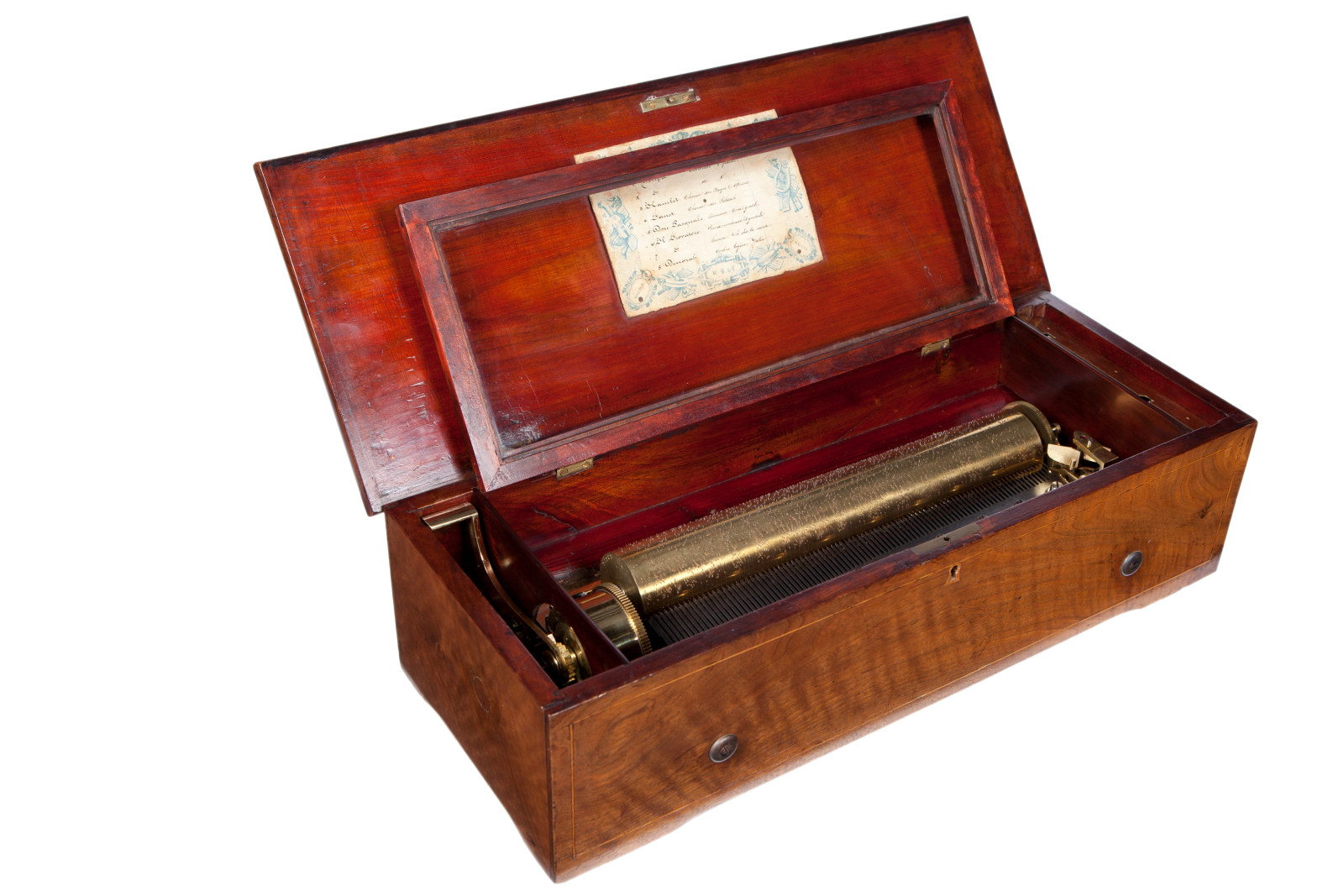 Eight tune music box housed in a fruit wood case, manufactured by Le Coultre, Geneva, c1860