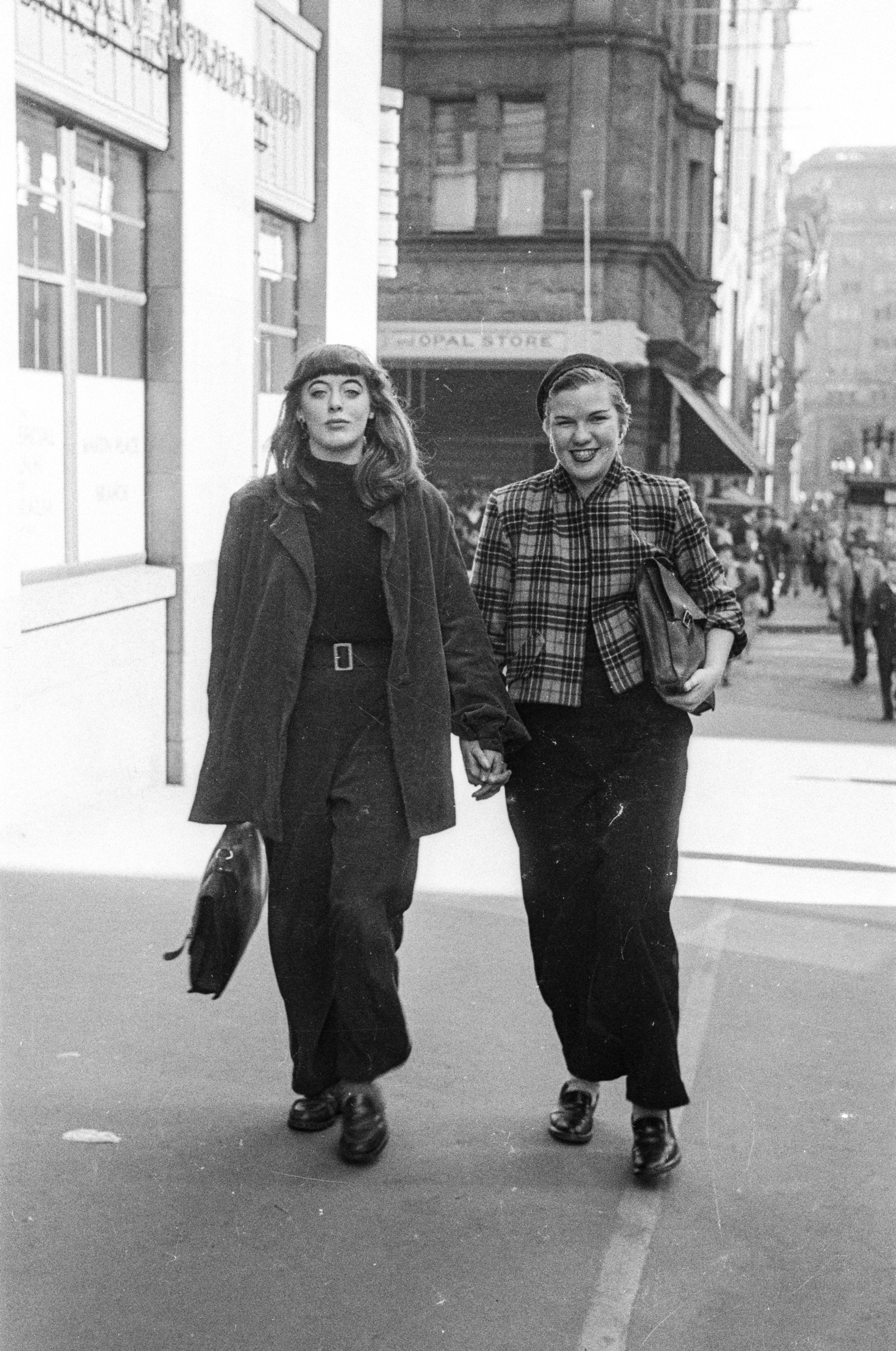 Candid street photograph of pedestrians taken in Martin Place, Sydney, by an unknown Ikon Studio photographer during 1950.