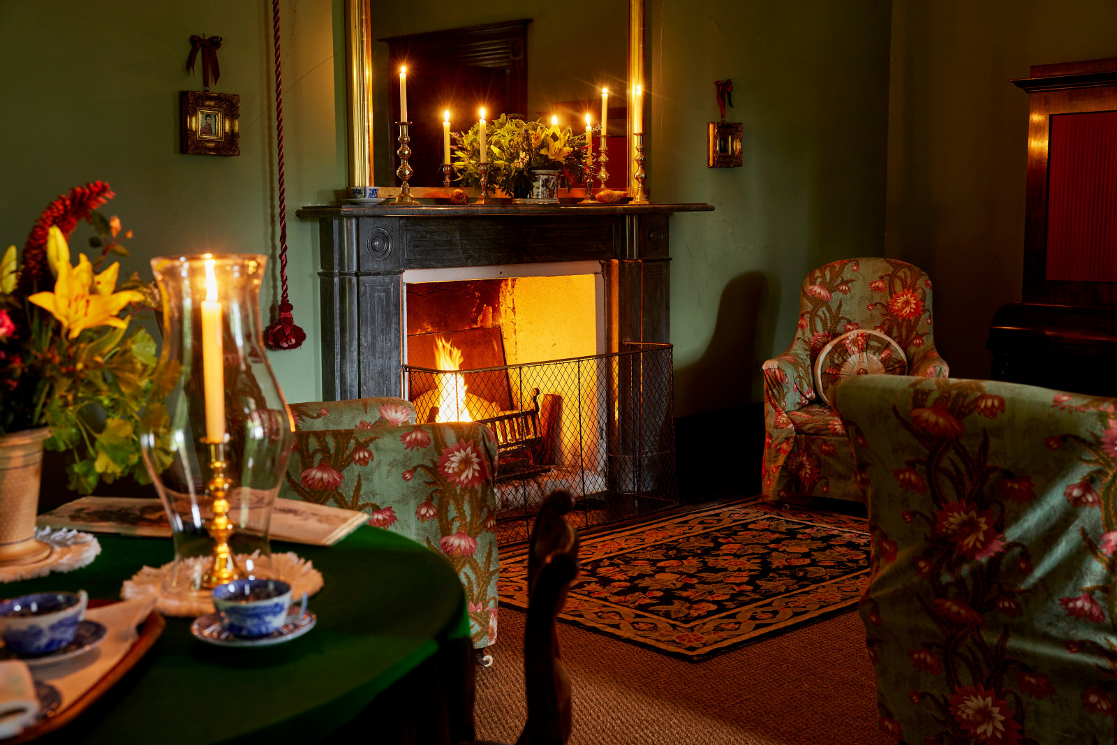 The drawing room at Elizabeth Farm lit by candles