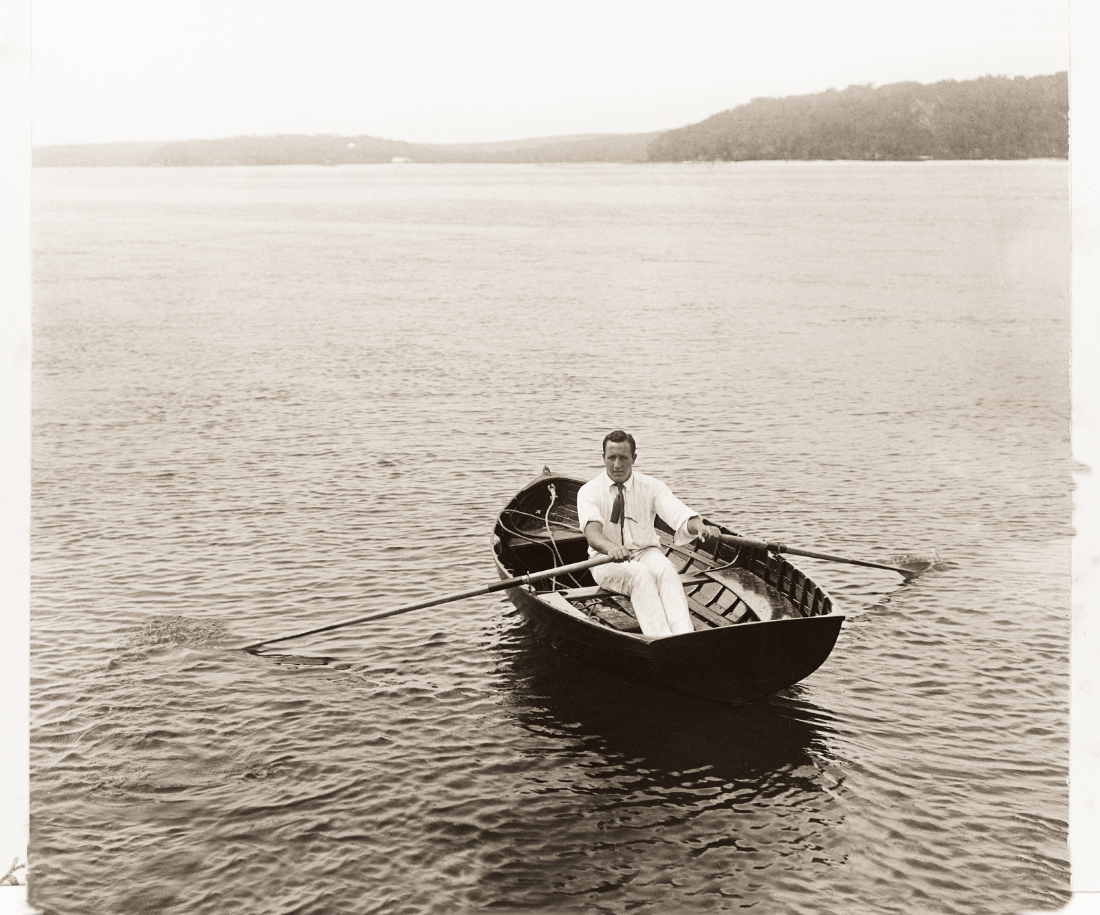 Cecil Healy in the dinghy, 'Port Hacking'