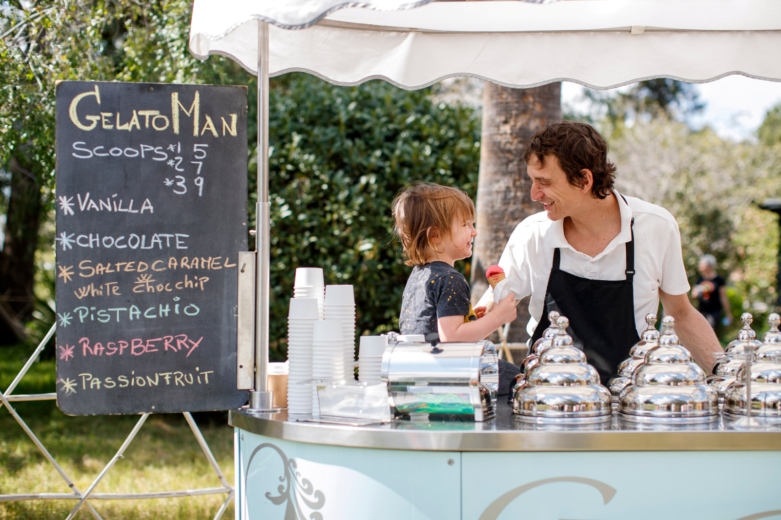 Stallholder, Massimo with son Ferdinand, and The Gelato Man market stall