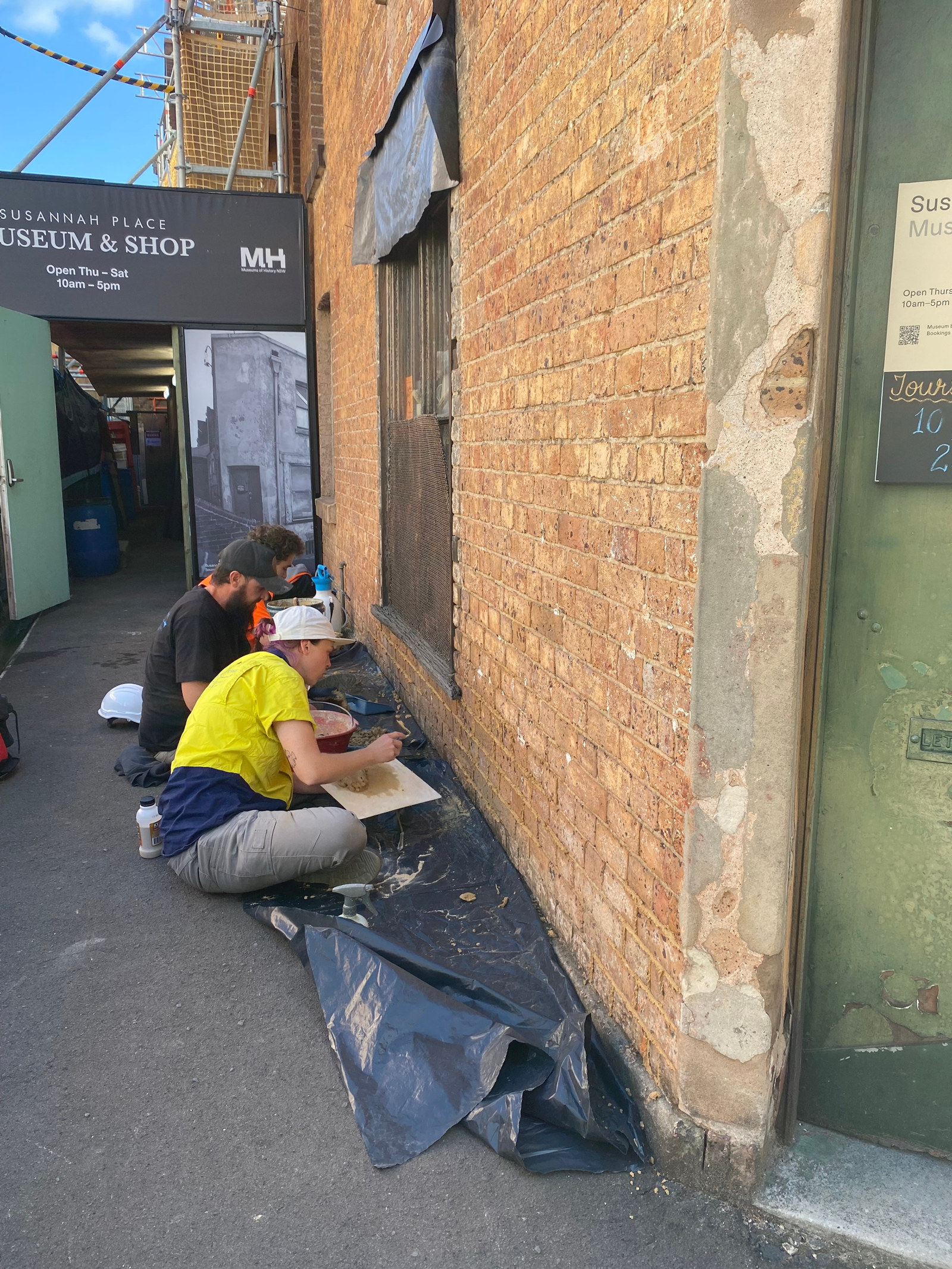 Artisan of Stone employees carrying out conservation work at Susannah Place
