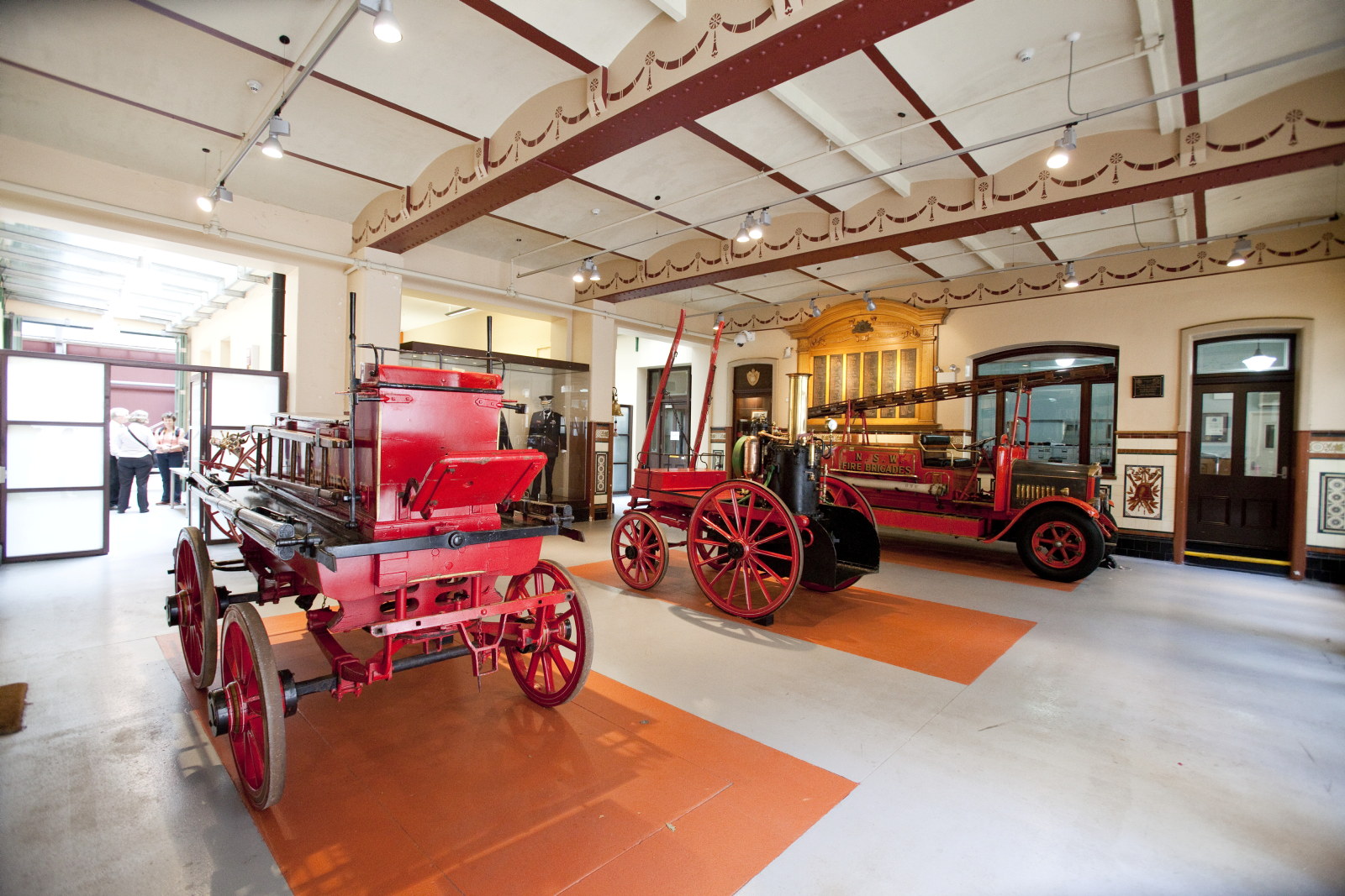Old fire engines inside The City of Sydney Fire Station